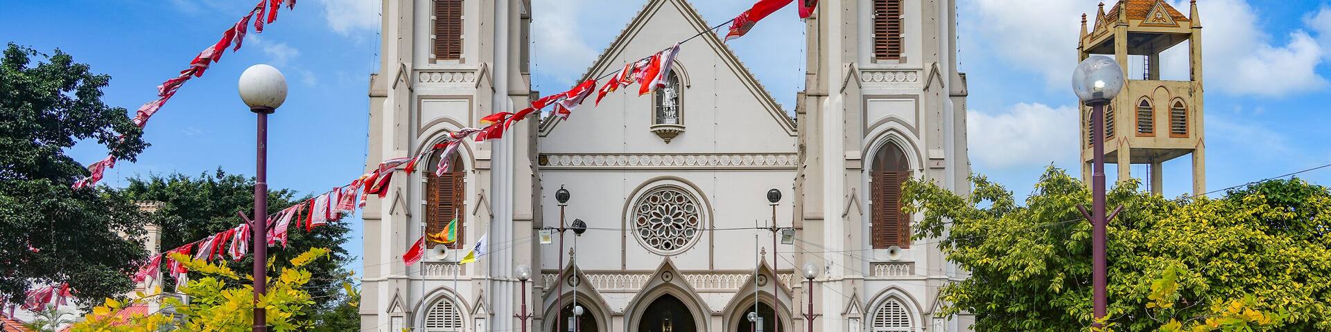 St. Sebastian Church in Negombo, Sri Lanka, Asia, is architecturally based on the Reims Cathedral in France and is built in Gothic Revival style.