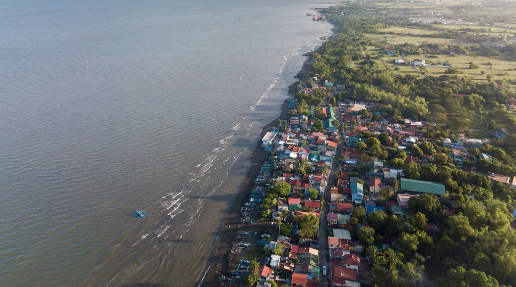Aerial of the coastline of Naic Cavite Philippines. Early morning drone shot.
