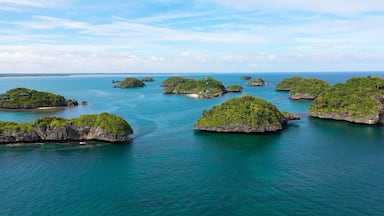 Cluster of small islands in Hundred Islands National Park, Pangasinan, Philippines. Aerial drone: Famous tourist attraction, Alaminos. Summer and travel vacation concept