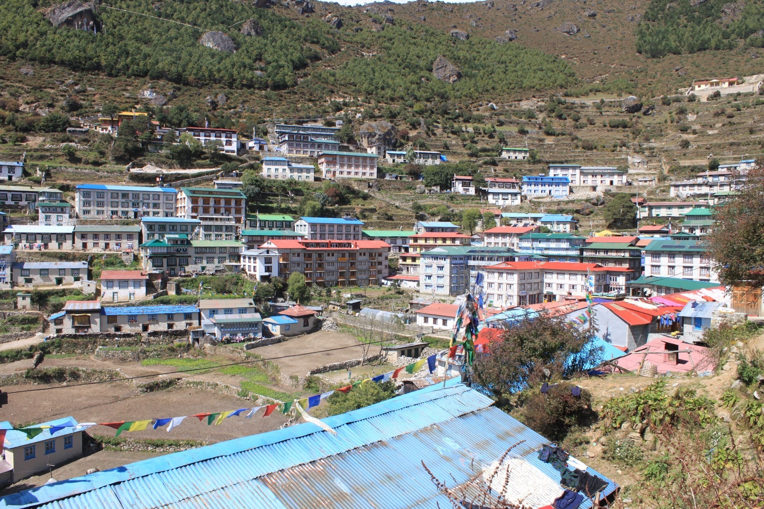 This is the village of Namche, the "capital" of the Sherpa people in Nepal. A place to stay 2 nights if you are following a sensible altitude acclimatisation schedule. Not only for yourself, but for your porters too! #nepal #himalaya #trekking
