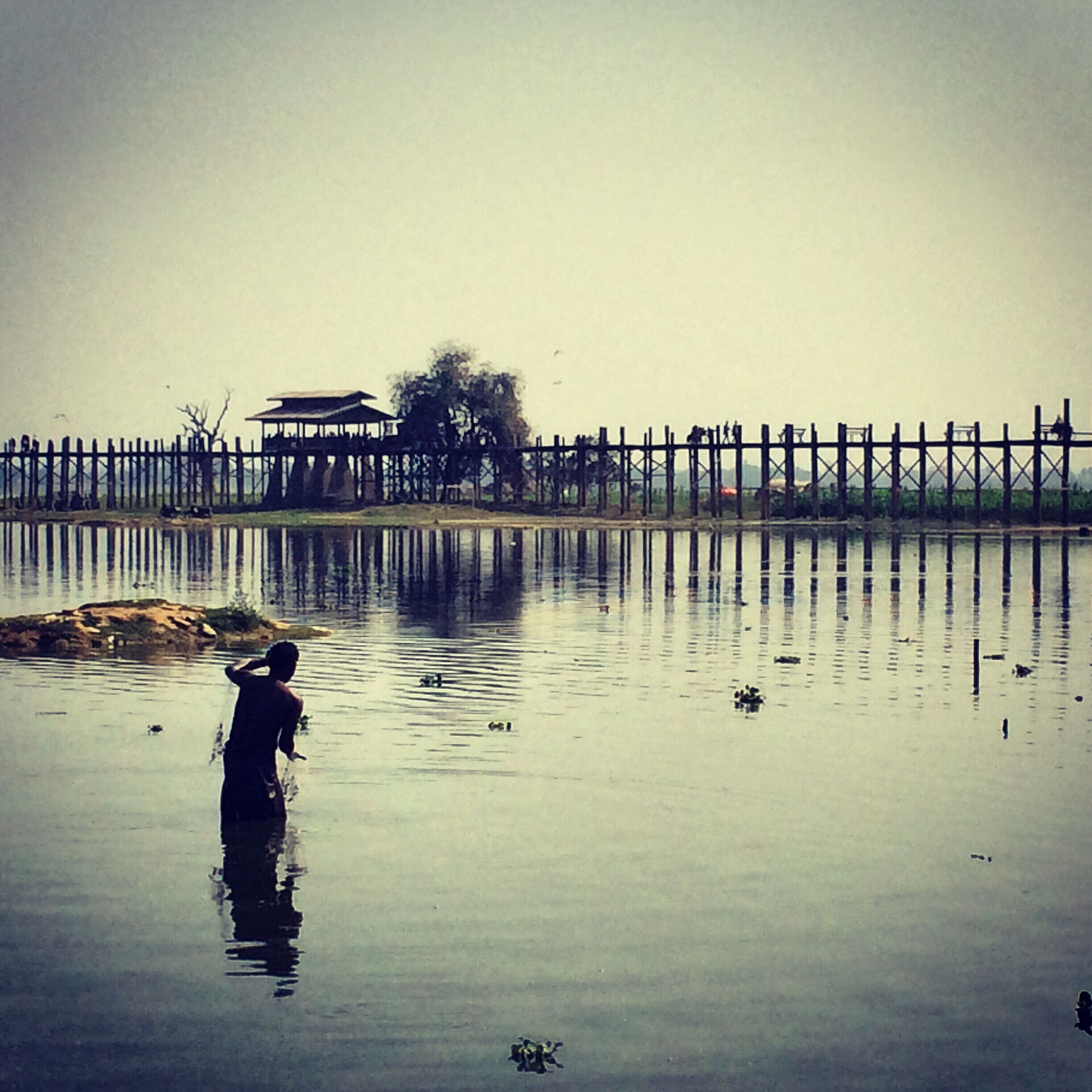 U Bein Bridge is a crossing that spans the Taungthaman Lake near Amarapura in Myanmar. The 1.2-kilometre bridge was built around 1850 and is believed to be the oldest and longest teakwood bridge in the world. 