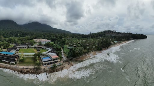 Creative Aerial Shots of the Santubong and Damai Beaches of Sarawak Malaysia, beside the South China Sea, with the mighty Mount Santubong as the background