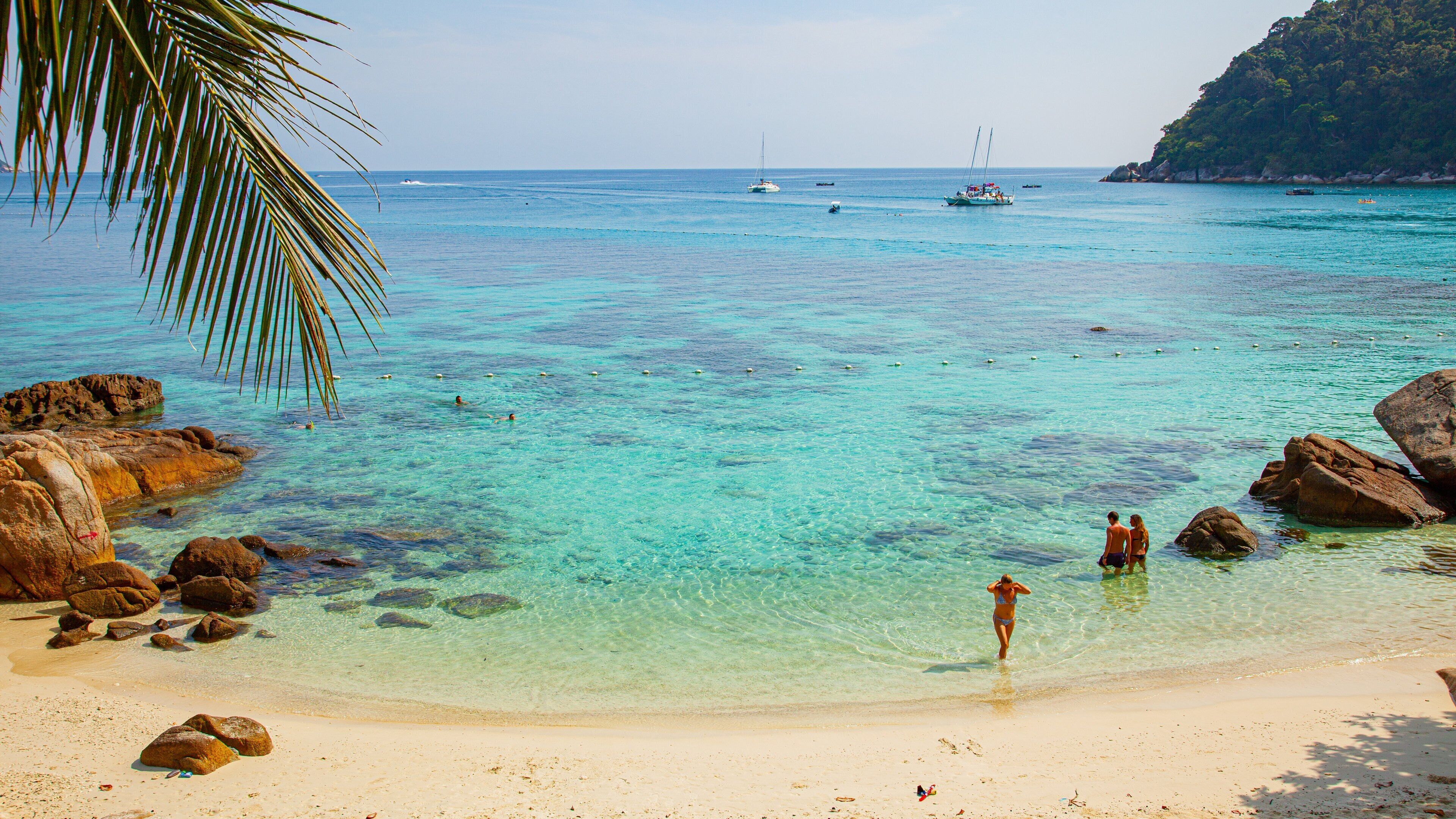 Perhentian Island showing tropical scenes, a beach and general coastal views