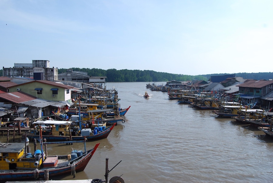 This sleepy fishing village is a really cool place to see. Near the tiny market in the middle of the village is a concrete walking/scooter bridge that crosses the river. This is where I took this photo and is the best place to see the heart of the village.