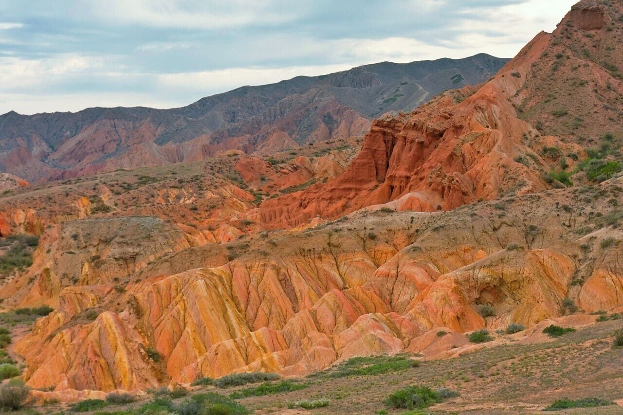 August 2013
Fairy tale canyon, Issyk-kul lake

Skazka (=Fairy tale) canyon on the south shore of Issyk-kul lake. It is located few kilometres from Tosor village and contains yellow, orange or red sandstone formations of various shapes resembling fairy tale dragons, giants or castles. This particular formation is similar to Rainbow hills in Iceland or rock chimneys in Cappadocia. The origin is mostly from wind and rain erosion. 