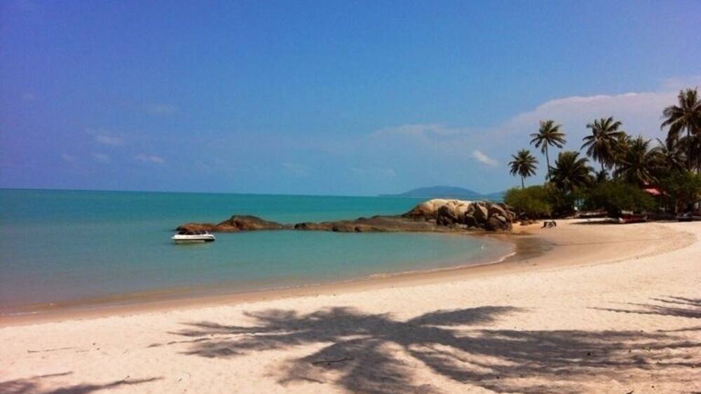 A friendly beach to swim in all day.