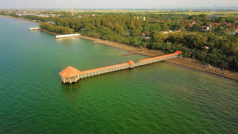 Beautiful aerial view, natural panorama - The beauty of the pier on Pemalang beach, Central Java-Indonesia.