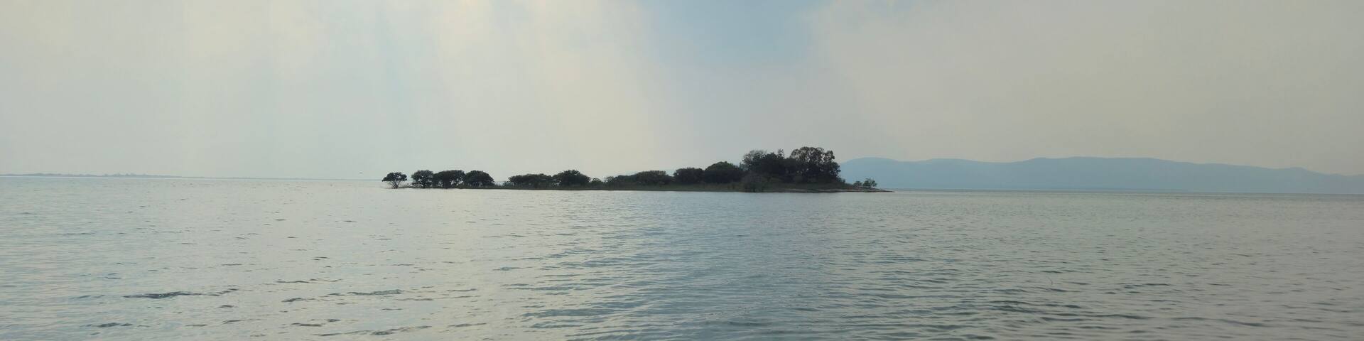 Hirakud Dam is built across the Mahanadi River, about 10 kilometres from Sambalpur in the state of Odisha in India. It is the longest earthen dam in the world. Hirakud Reservoir