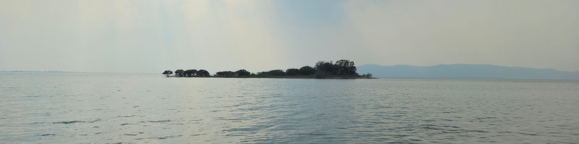 Hirakud Dam is built across the Mahanadi River, about 10 kilometres from Sambalpur in the state of Odisha in India. It is the longest earthen dam in the world. Hirakud Reservoir