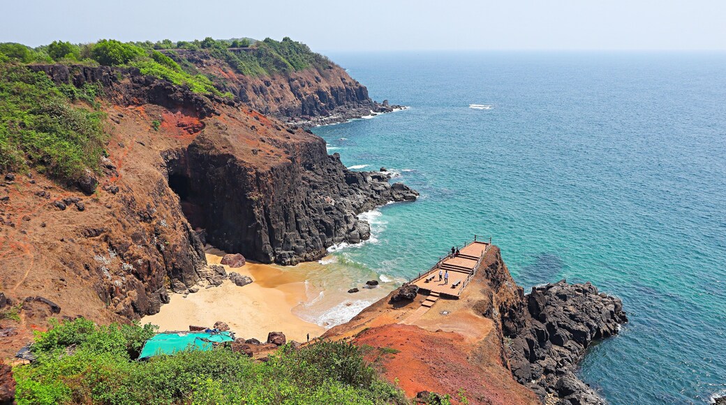 View of the rocky cliff and sunset point at Devghali, Kaseli Beach, Ratnagiri, Maharashtra, India.