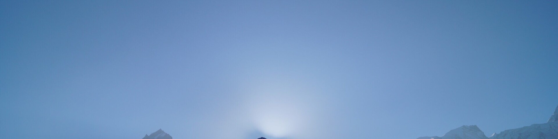 #Blue
We reached Kalpa at night and went straight to bed. The morning was one of the most Bluest morning I ever saw. The Kinnaur ranges infront peaking from the windows. It is believed that Lord Shiva stayed at this mountain. When you zoom the pic, "V" cut on the extreme left there is a Shiva lingam.
My next destination will be to reach and pray at the Shiva lingam.