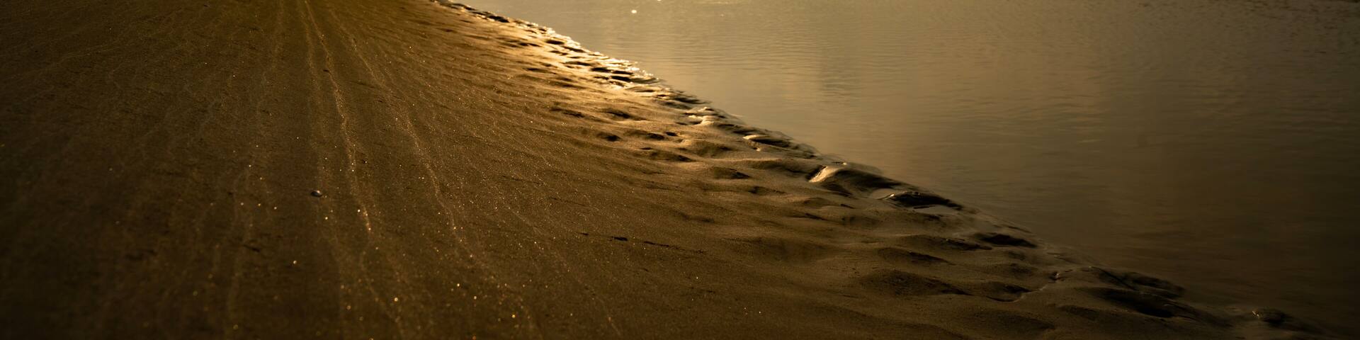 Landscape of bakkhali sea beach. Sea Beach of Bakkhali, West Bengal, India. Sunrise from Bakkhali sea beach. Land view after water run off at sea beach. photo taken at Bakkhali
