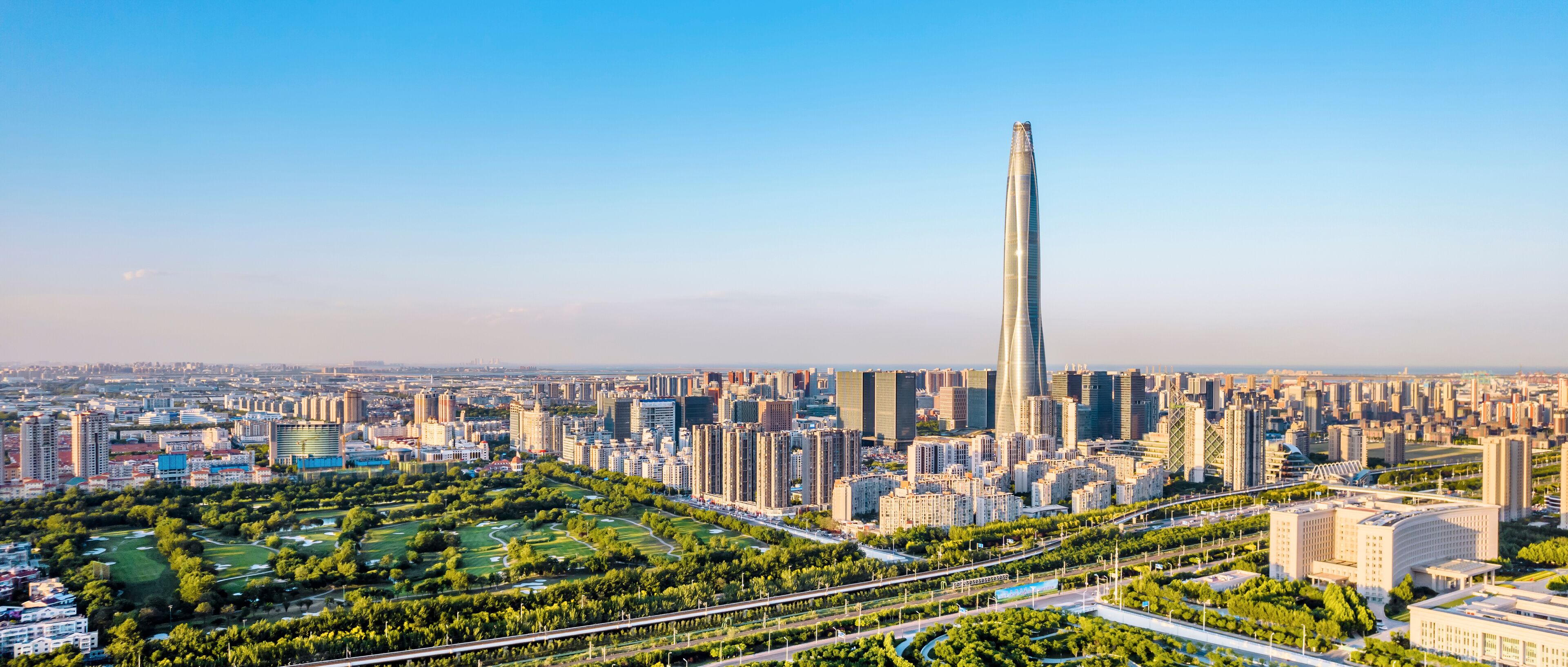 Aerial shot of the skyline of Chow Tai Fook Finance Center in Binhai New Area, Tianjin, China
