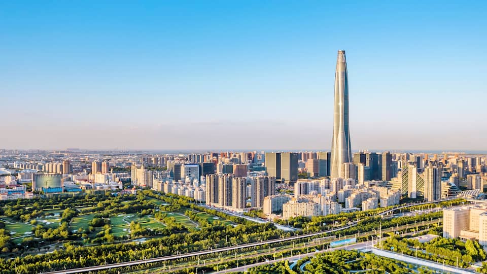 Aerial shot of the skyline of Chow Tai Fook Finance Center in Binhai New Area, Tianjin, China