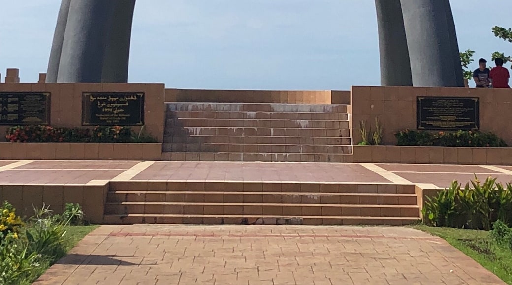 A big sculpture that overlooks the beach in Seria.