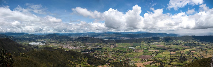 Peña de la Juaica landscape. A sacred mountain of colombian muisca pre colombus culture at Tabio town with hills and clouds at sunny day