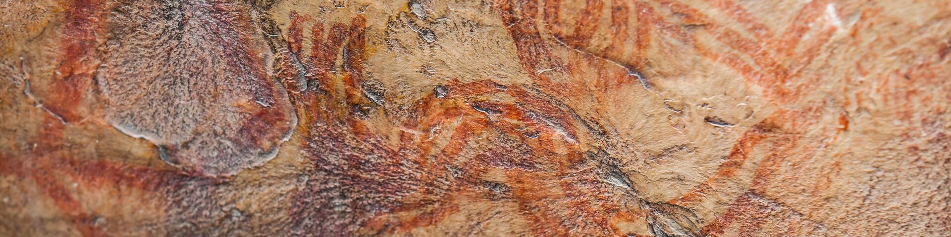 Prehistoric paintings on rock known as petroglyphs in the municipality of Facatativa in Colombia