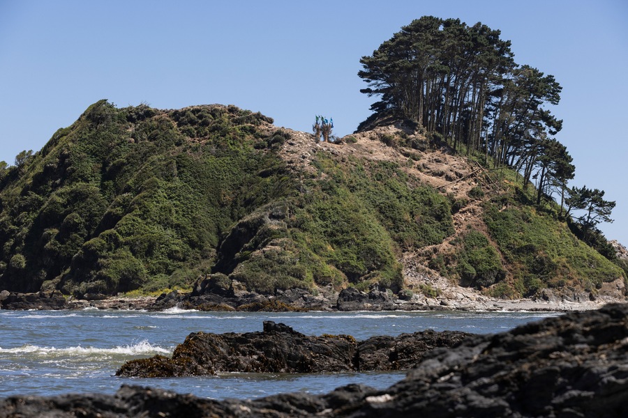 Isla Maiquillahue and big, serrated rocks in the Pacific Ocean of Chile