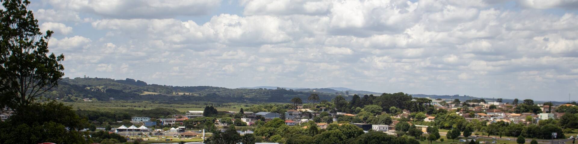 Castro Paraná Brazil Welcome sign at the top of the hill in the city of Castro with an aerial view in the background