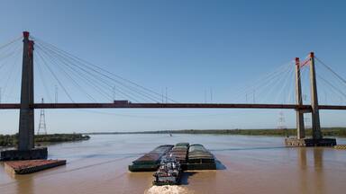 Long Arm Zarate Bridge, located in South America, Argentina, divides the province of Buenos Aires and Entre Rios. below this ship, cargo ships to Brazil and other destinations.