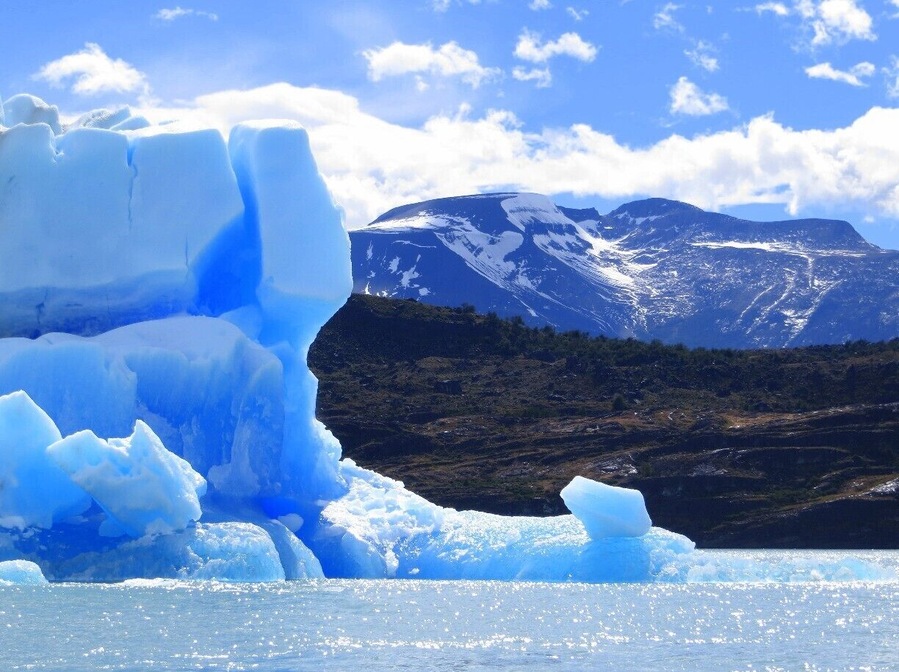 #TroveOn Massive icebergs protrude from the water near Upsala Glacier.