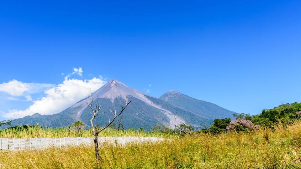 A mountain landscape with a clear sky.