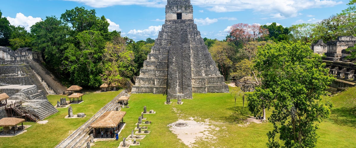 Great Plaza with Temple of the Grand Jaguar pyramid, Tikal national park, Guatemala.