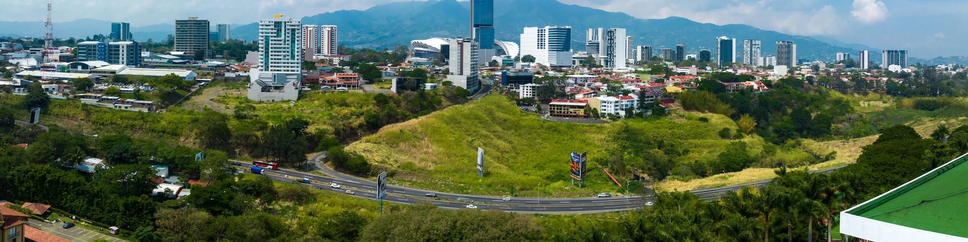 Beautiful aerial view of the Sabana, San Jose, Costa Rica. San Jose Costa rica capital city street view with mountains in the background.