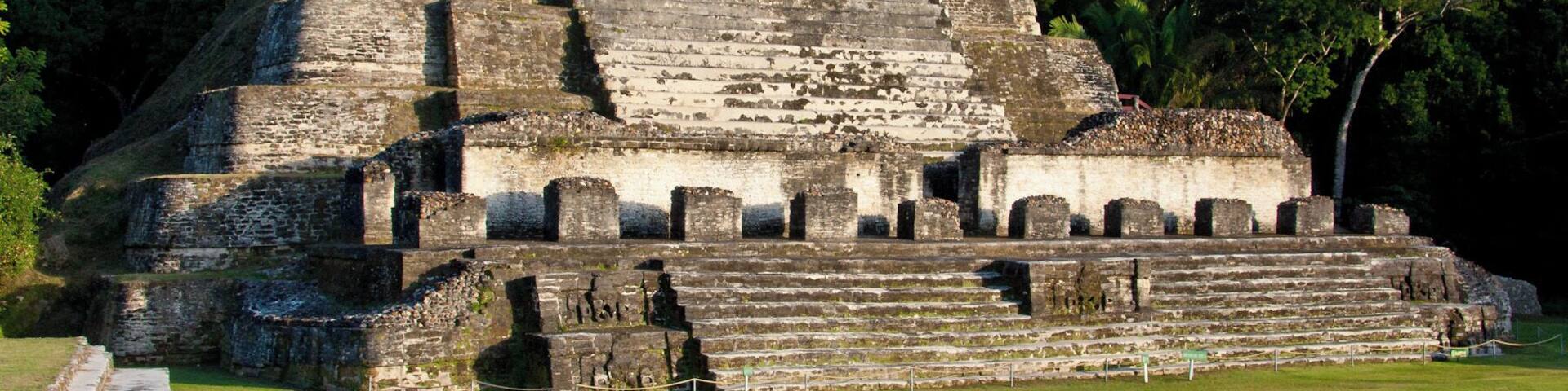 Altun Ha is a ruined Mayan city in northern Belize. The largest of the temple-pyramids on the site, the "Temple of the Masonry Alters", is 54 feet (16 m) high. A drawing of this structure is the logo of Belize's leading brand of beer, Belikin.
