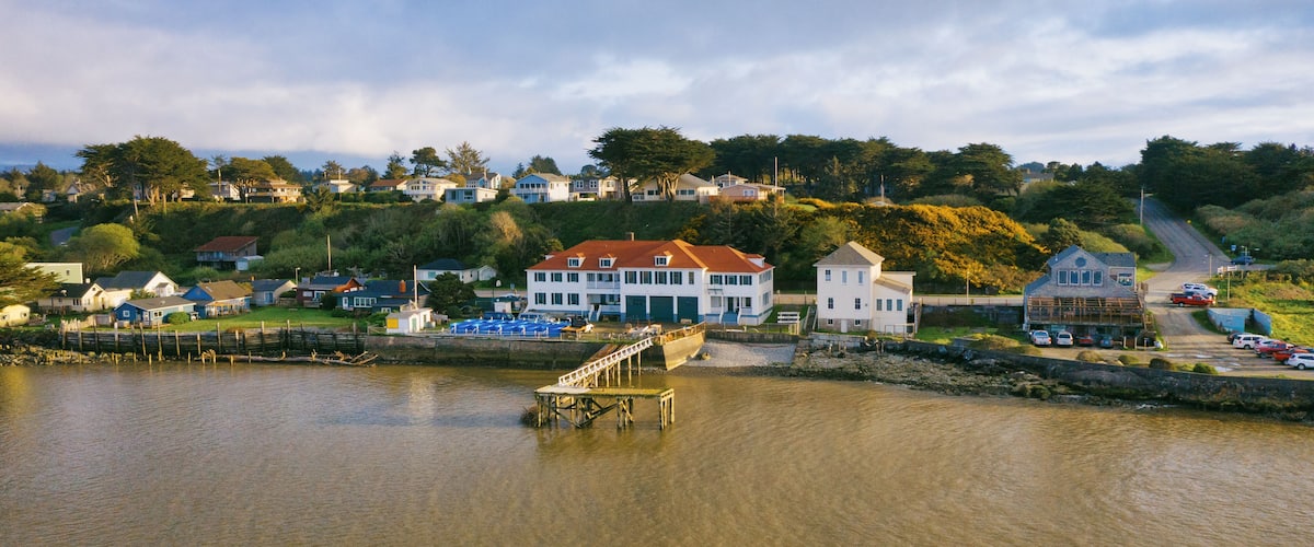 Old Coastguard station in Bandon Oregon, aerial view during sunny afternoon.