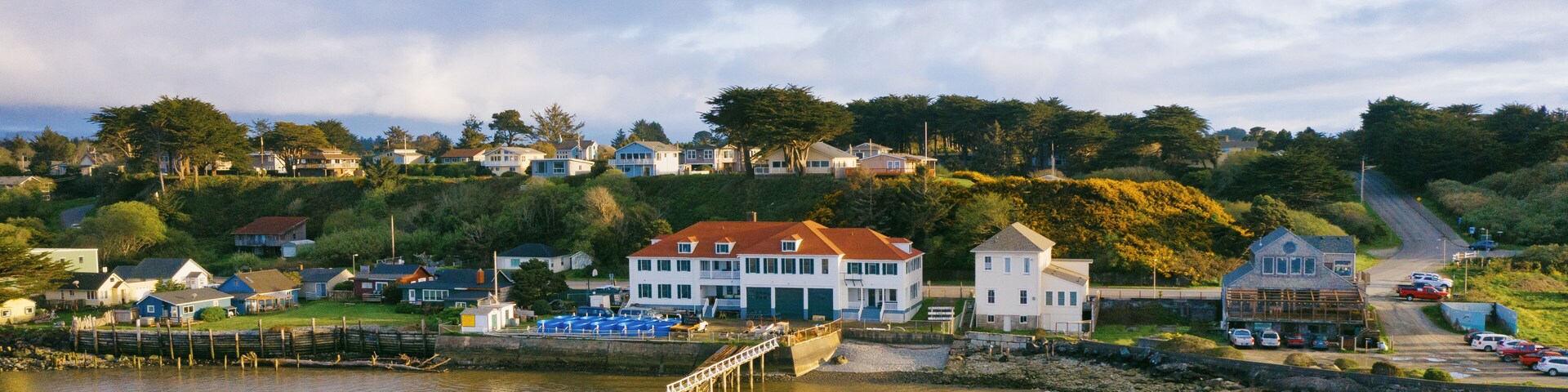 Old Coastguard station in Bandon Oregon, aerial view during sunny afternoon.