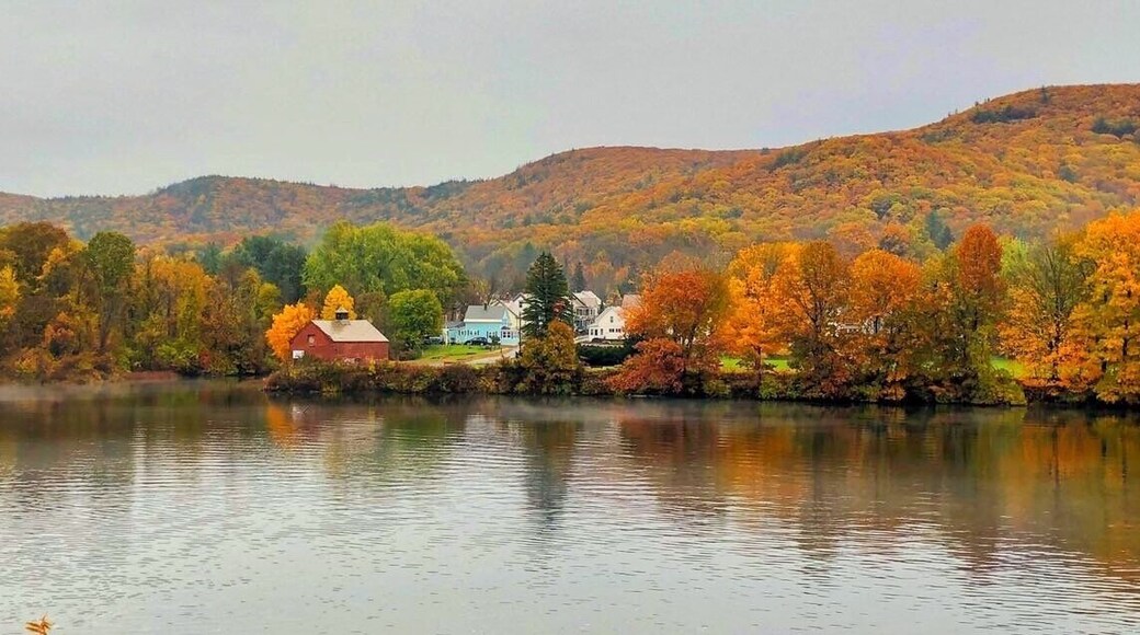 Taken in Bellows Fall, Vermont overlooking the Fall Mountain in North Walpole, New Hampshire across the Connecticut River. This area always catches my eyes in the Fall season because of the intense colorful leaves on the trees and also how they reflect on the river.