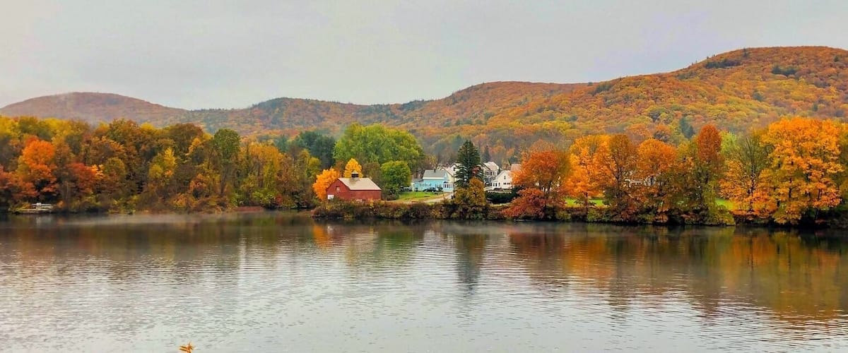 Taken in Bellows Fall, Vermont overlooking the Fall Mountain in North Walpole, New Hampshire across the Connecticut River. This area always catches my eyes in the Fall season because of the intense colorful leaves on the trees and also how they reflect on the river.