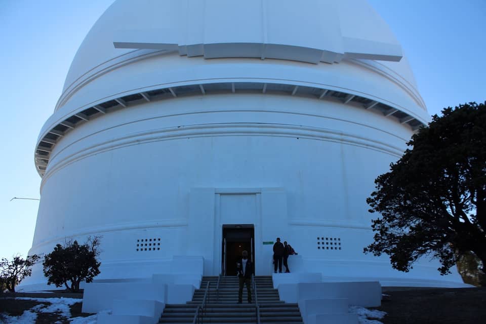 A large white dome structure with stairs leading up to the entrance.