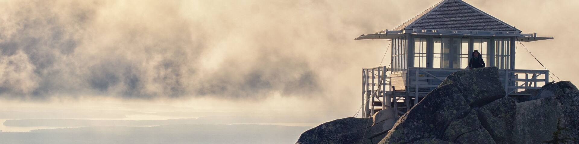 Island in the sky at the Mount Pilchuck look out, reviews out across Puget Sound. It’s moderate hike an hour north of Seattle, but check US Forest Service Road 42 conditions, they could be rough for low clearance vehicles.