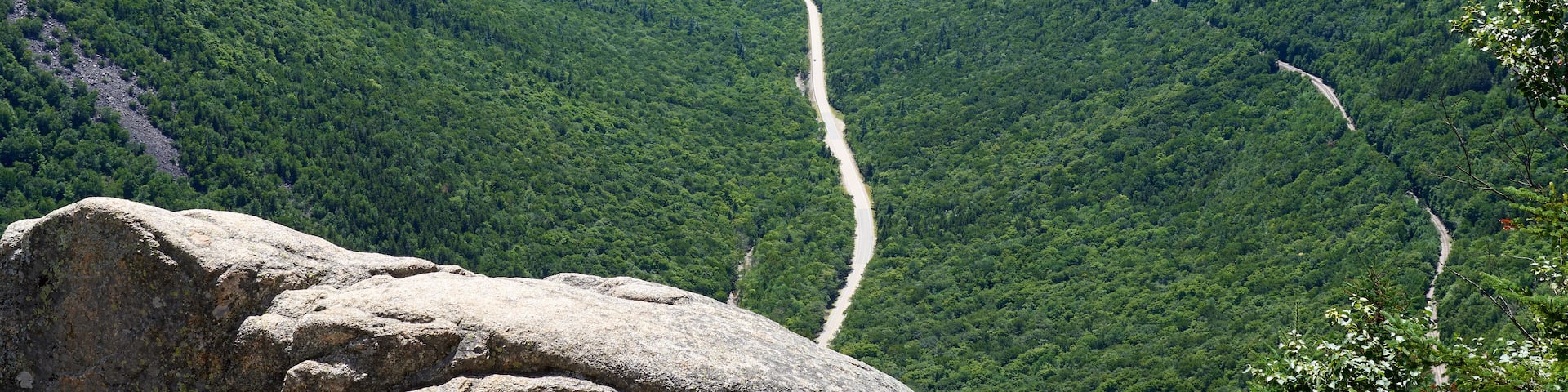 The scenic view of Crawford Notch in the summer from Mt. Willard (2,865 ft) in Carroll County in the White Mountains of NH