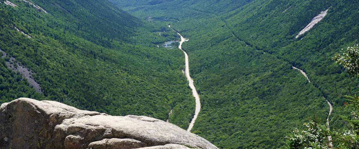 The scenic view of Crawford Notch in the summer from Mt. Willard (2,865 ft) in Carroll County in the White Mountains of NH