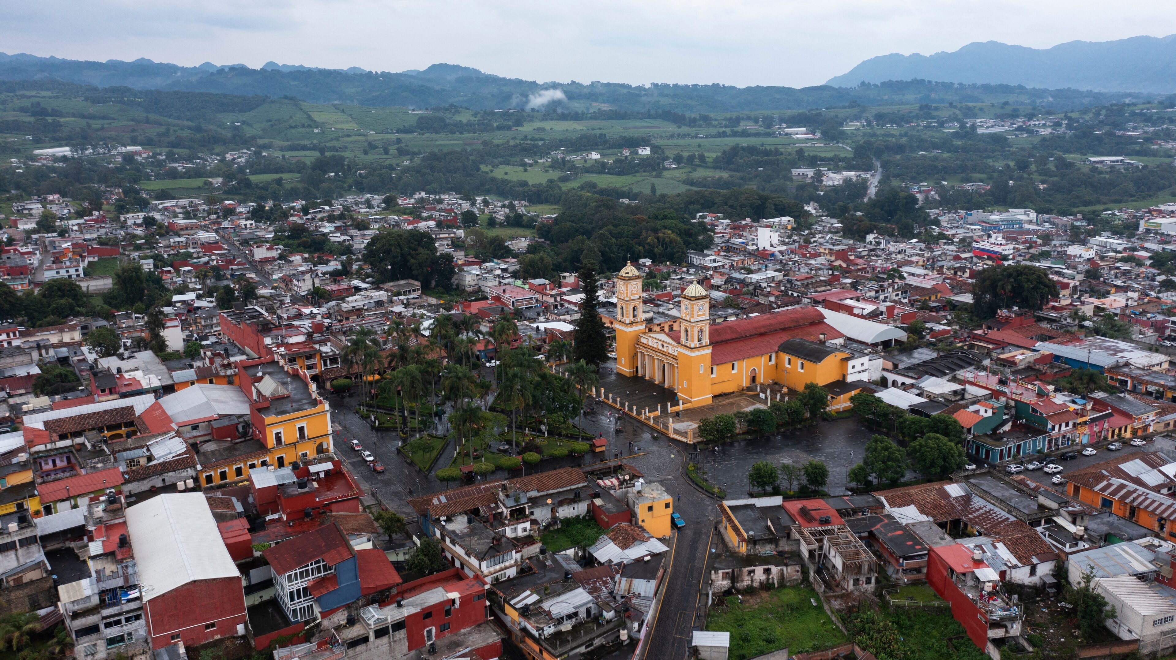 Coscomatepec de Bravo, Veracruz, Mexico - July 13, 2022: Late afternoon monsoon rains fall on the historic city center of Coscomatepec.