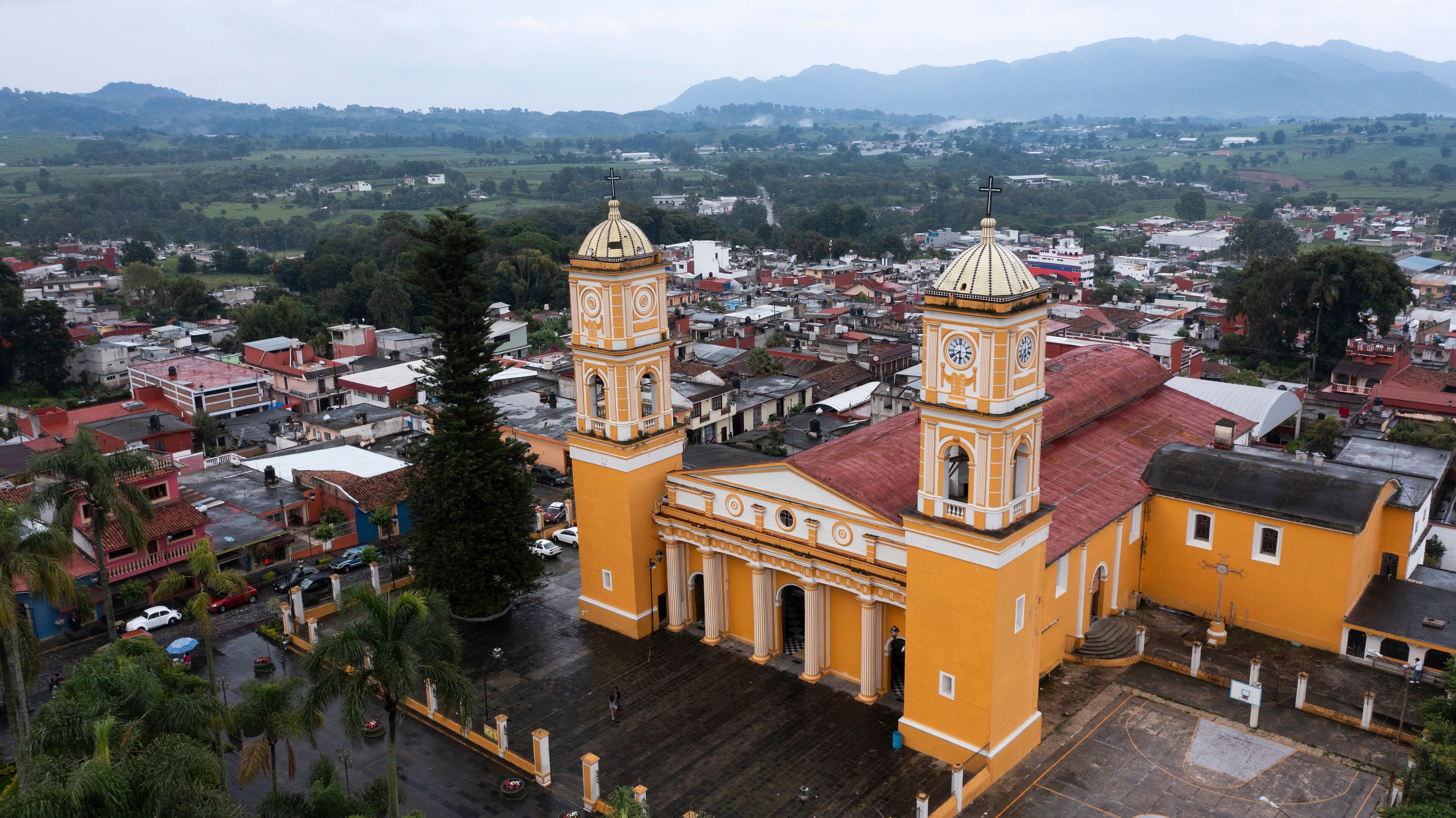 Coscomatepec de Bravo, Veracruz, Mexico - July 13, 2022: Late afternoon monsoon rains fall on the historic city center of Coscomatepec.