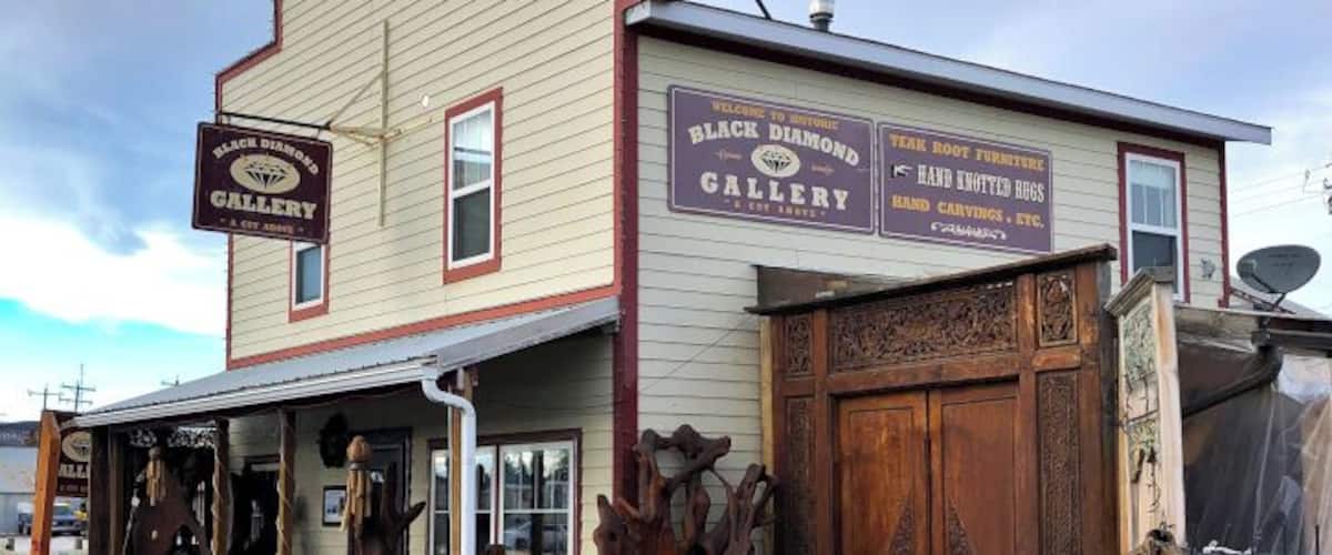 Woodworkers and carvers will love this treasure trove of unique furniture imported from Indonesia, Myanmar, the Philippines, Turkey, Morocco, and the Middle East. Although wood is the feature, there are also items such as carpets, stone, and sculptures. Definitely a unique place to stop and shop while in Black Diamond. Don't miss the wooden T-Rex hiding behind the fence in the backyard.