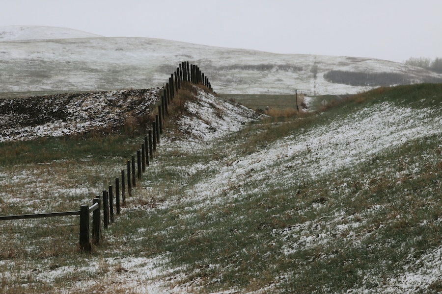 The last gasp of winter dusts the hills and fields near Black Diamond in Alberta.