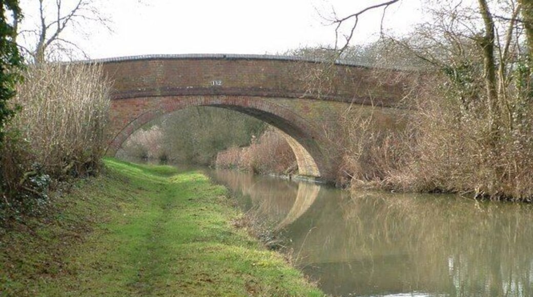 Bridge 132 over the Oxford Canal at Wormleighton, Warwickshire, seen from the towpath. The bridge carries a farm track.