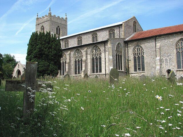 St Mary's church The old simple wooden cross seen in the foreground (left) is located in the southeastern-most corner of the churchyard. St Mary's church faces the village green with what remains of a village pump in its centre > https://www.geograph.org.uk/photo/840847. Dating from the 14th and 15th centuries, the church was extensively restored > https://www.geograph.org.uk/photo/840900 - https://www.geograph.org.uk/photo/840902 but a late 14th century font remains > https://www.geograph.org.uk/photo/840904 and the tower screen has presumably been fashioned from parts of the 15th century rood screen. The unusual stained glass in the aisle windows > https://www.geograph.org.uk/photo/840907 and the west window date from 1874. There are also a few interesting brasses, one a very rare so-called cadaver brass - a shrouded skeleton > https://www.geograph.org.uk/photo/840912 - to Thomas Brigge (d. 1470). The church is open every day. See also: http://www.norfolkchurches.co.uk/wiveton/wiveton.htm