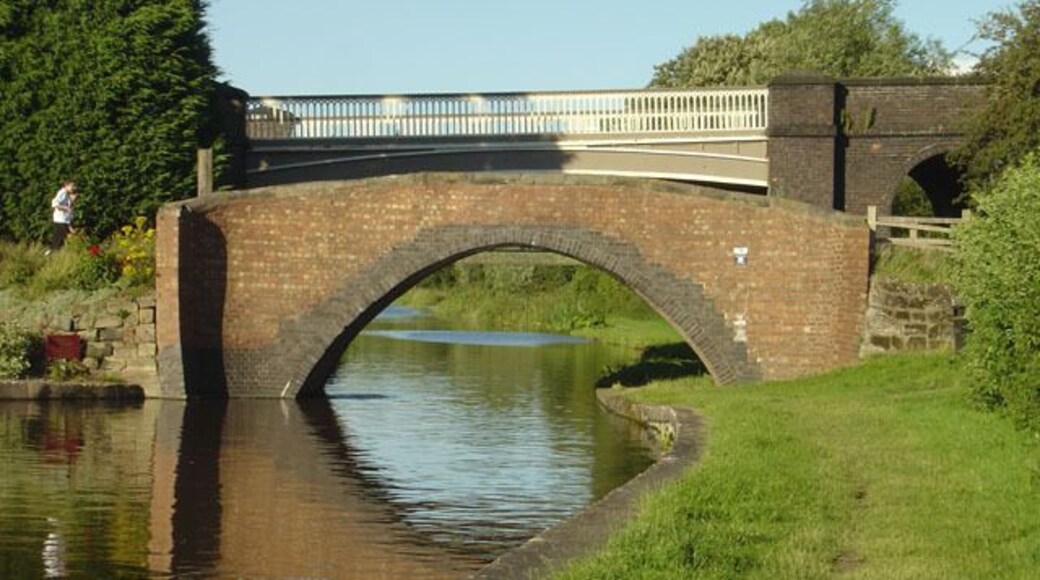 Buckford Bridge The old and the 'new'. The traditional brick canal bridge now only gives pedestrian access to the canal towpath. The new bridge was built to cross the railway which is alongside the canal at this point.