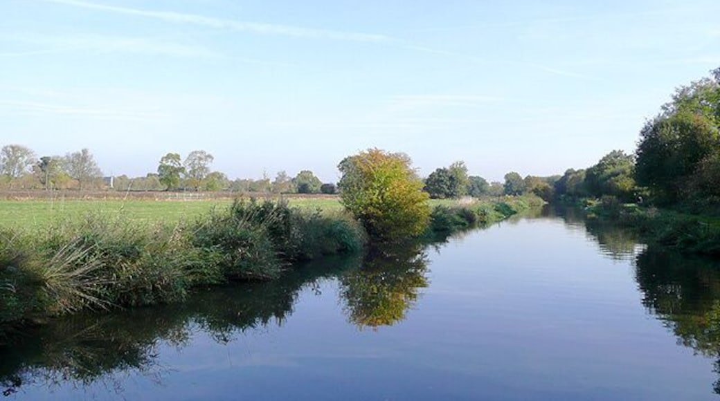 Trent and Mersey Canal near Findern, Derbyshire The canal takes a fairly straight course here through the flat farm lands on the Trent Valley bottom east of the Buckford bridges. The railway line between Stoke (or Burton) and Derby runs to the right of the picture less than thirty metres behind the trees.