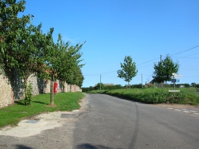 Wighton This is one end of Wighton, on the eastern side of the River Stiffkey (a small stream here). To the right leads to Great Walsingham, to the left to Binham.