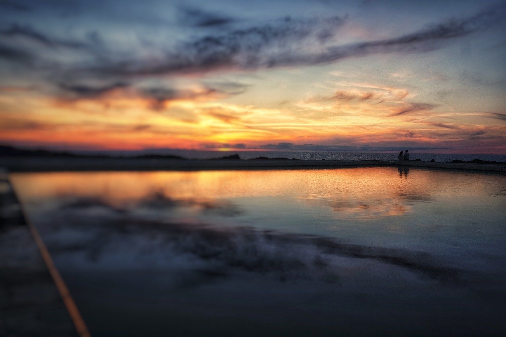 Westward Ho! sea pool at sunset.