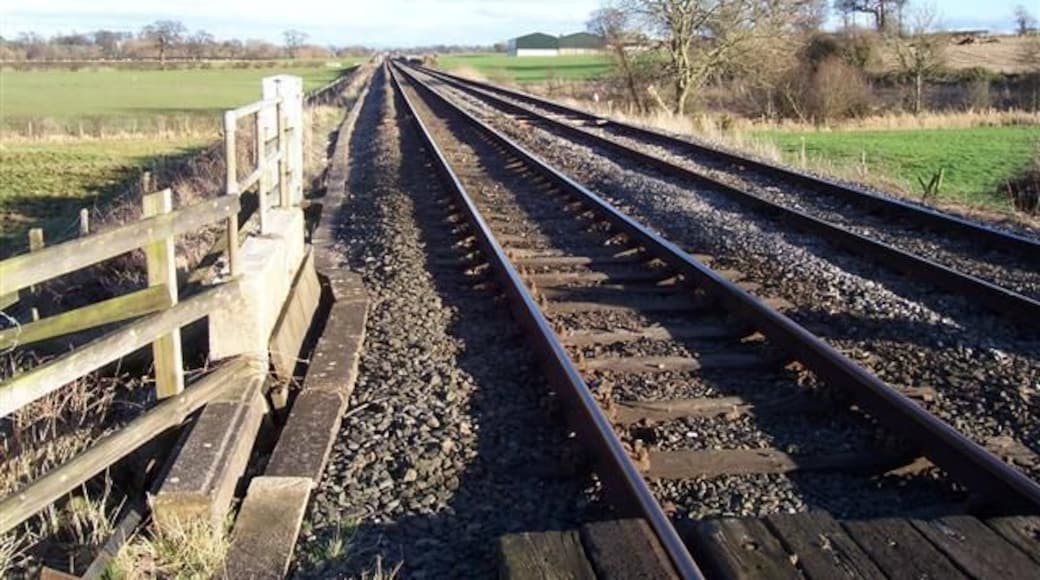 Up the line to Carlisle. With East Woodside Farm shown over the line further up.