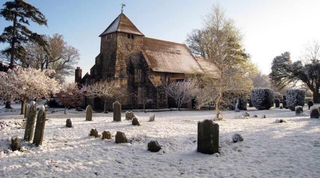St John the Baptist's parish church, Westfield, East Sussex, seen from the southwest in snow