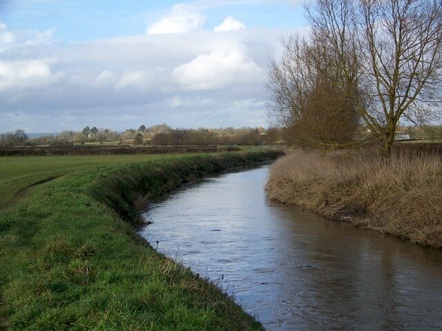 River Brue, Barton St David Looking from beside Tootle Bridge. A footpath runs along the edge of the river that takes walkers towards Catsham.